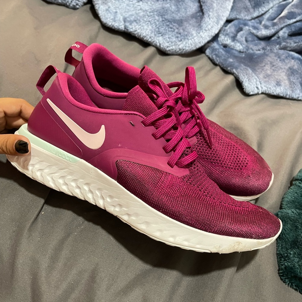 Pink Nike running shoes